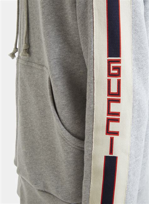 hooded zip-up sweatshirt with gucci stripe fake|real gucci hoodie.